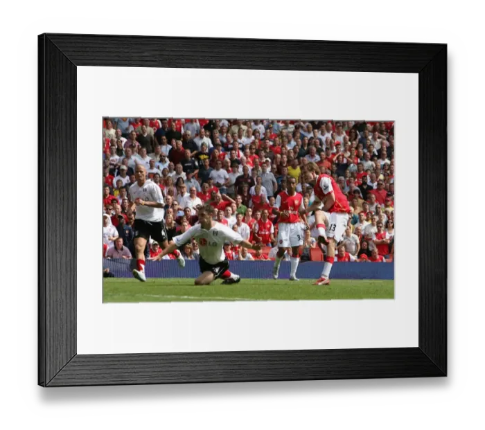 Framed Print : Alex Hleb shoots past Fulham defender Chris Baird to score the 2nd Arsenal goal