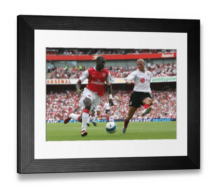 Framed Print : Arsenal's Eboue vs. Konchesky: A Battle at Emirates Stadium - Arsenal's 2:1 Victory in the Premier League (December 8, 2007) Framed Print : Arsenal's Eboue vs. Konchesky: A Battle at Emirates Stadium - Arsenal's 2:1 Victory in the Premier League (December 8, 2007)