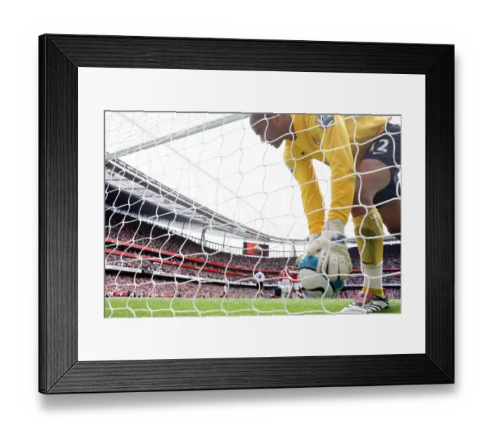 Framed Print : Fulham goalkeeper Tony Warner picks the ball out of the net after Robin van Persies penalty