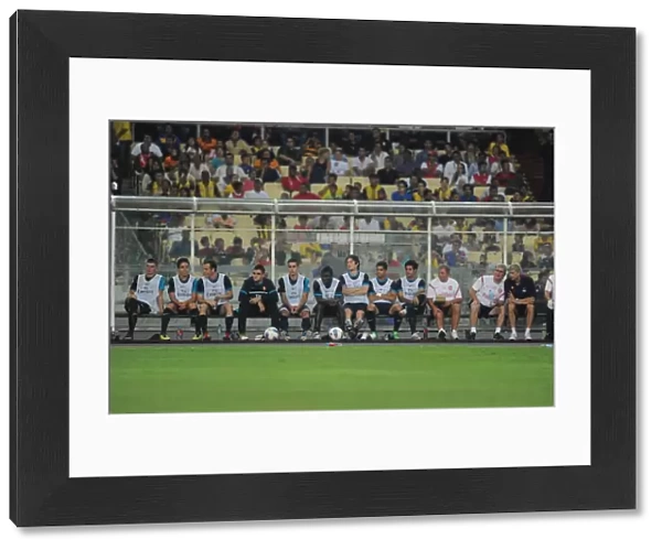 The Arsenal bench. Malaysia XI 0: 4 Arsenal, Bukit Jalil Stadium, Kuala Lumpur, Malaysia, 13  /  7  /  2011