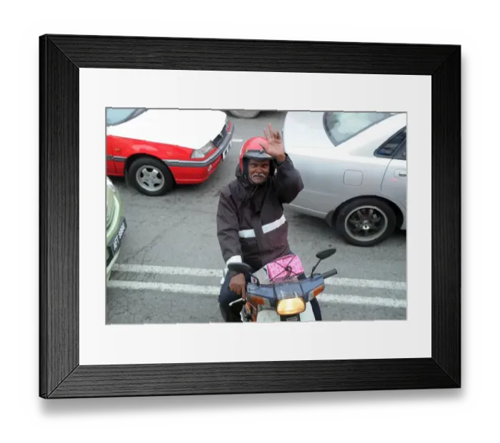 Framed Print : Arsenal fan, Kuala Lumpur, Malaysia, 13  /  7  /  2011. Credit : Stuart MacFarlane  /  Arsenal Football Club