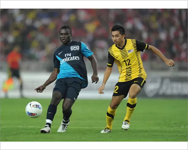 Emmanuel Frimpong (Arsenal) Amar Rohidan (Malaysia). Malaysia XI 0: 4 Arsenal