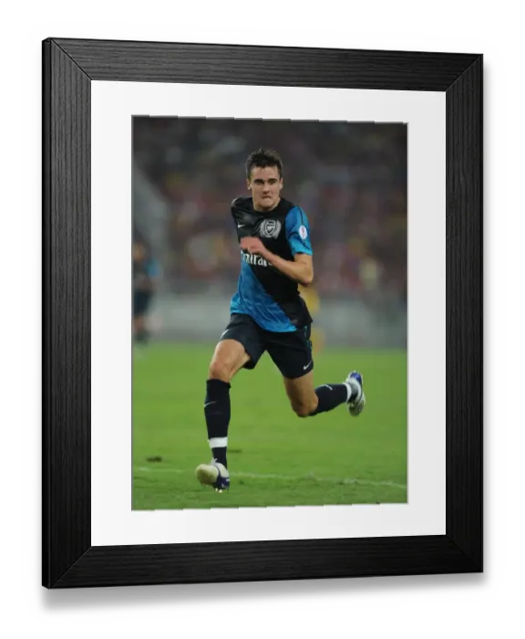 Framed Print : Carl Jenkinson's Brilliant Performance in Arsenal's 4-0 Victory over Malaysia XI Framed Print : Carl Jenkinson's Brilliant Performance in Arsenal's 4-0 Victory over Malaysia XI