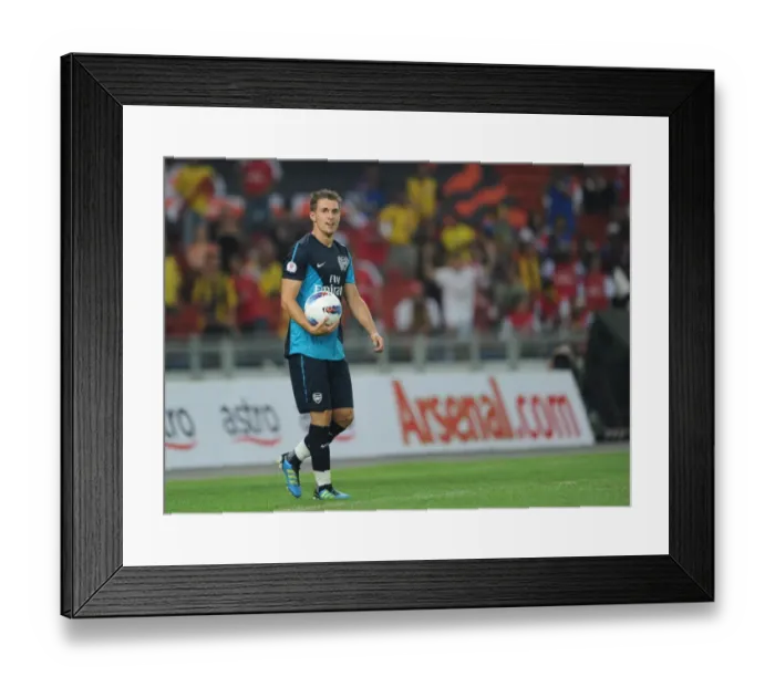 Framed Print : Aaron Ramsey (Arsenal). Malaysia XI 0: 4 Arsenal, Bukit Jalil Stadium, Kuala Lumpur Framed Print : Aaron Ramsey (Arsenal). Malaysia XI 0: 4 Arsenal, Bukit Jalil Stadium, Kuala Lumpur