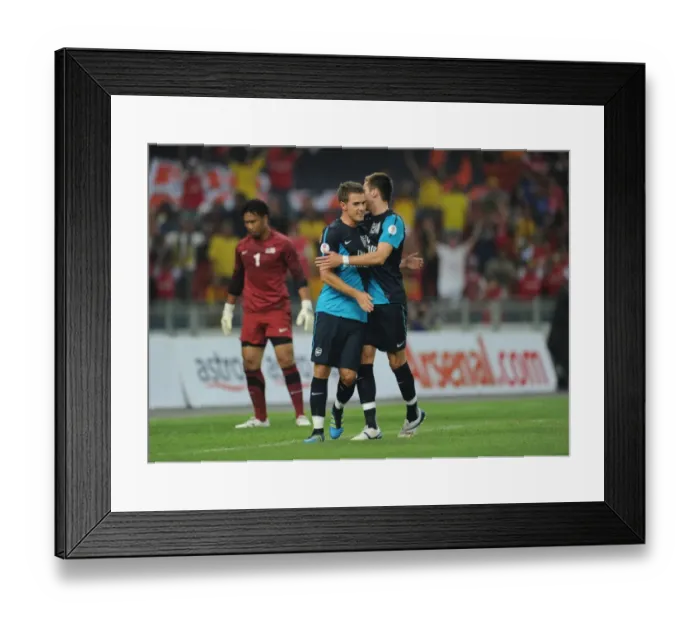 Framed Print : Aaron Ramsey celebrates scoring the 1st Arsenal goal with Carl Jenkinson Framed Print : Aaron Ramsey celebrates scoring the 1st Arsenal goal with Carl Jenkinson