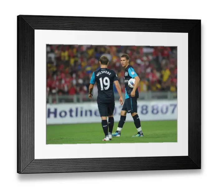 Framed Print : Aaron Ramsey and Jack Wilshere (Arsenal). Malaysia XI 0: 4 Arsenal, Bukit Jalil Stadium