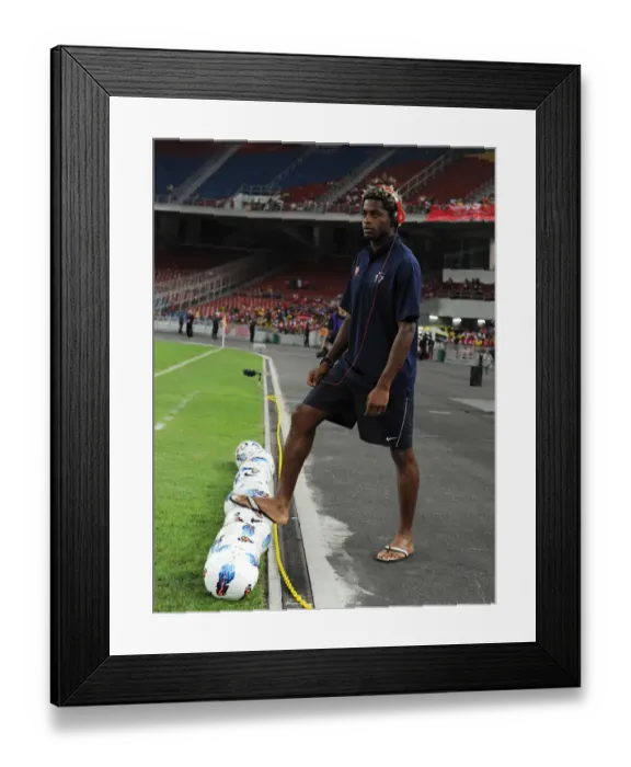 Framed Print : Alex Song (Arsenal). Malaysia XI 0: 4 Arsenal, Bukit Jalil Stadium, Kuala Lumpur Framed Print : Alex Song (Arsenal). Malaysia XI 0: 4 Arsenal, Bukit Jalil Stadium, Kuala Lumpur