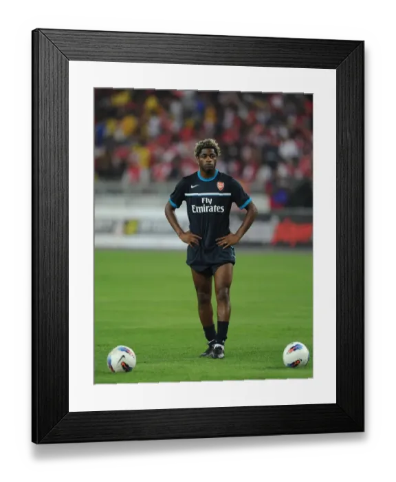 Framed Print : Alex Song's Brilliant Performance: Arsenal Crushes Malaysia XI 4-0 at Bukit Jalil Stadium