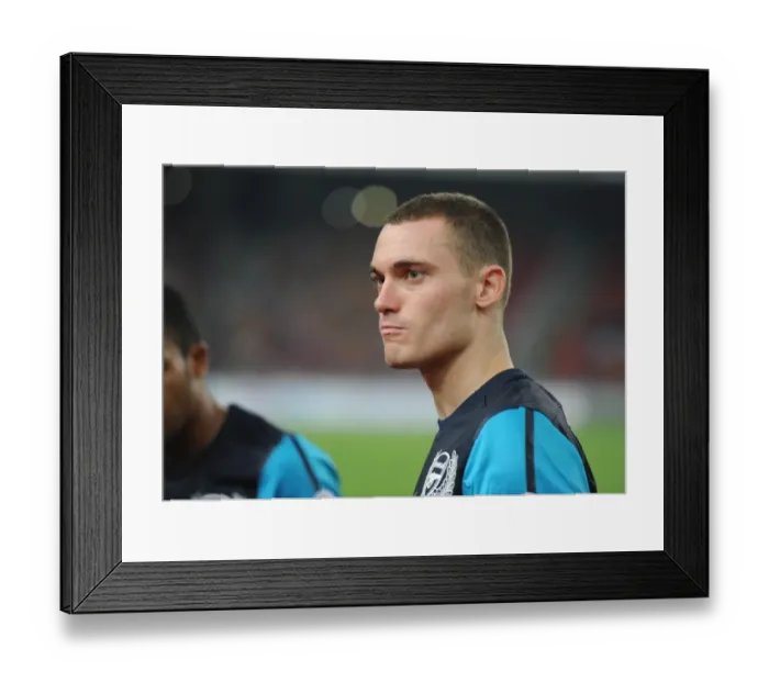 Framed Print : Thomas Vermaelen's Dominant Display: Arsenal Crushes Malaysia XI 4-0