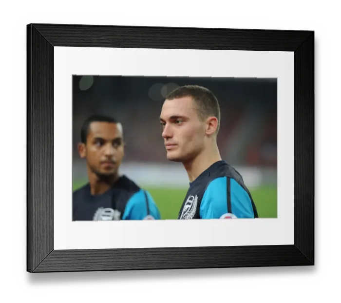 Framed Print : Thomas Vermaelen's Dominance: Arsenal Crushes Malaysia XI 4-0 at Bukit Jalil Stadium