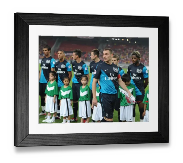 Framed Print : Thomas Vermaelen's Unstoppable Performance: Arsenal's 4-0 Victory Over Malaysia XI Framed Print : Thomas Vermaelen's Unstoppable Performance: Arsenal's 4-0 Victory Over Malaysia XI