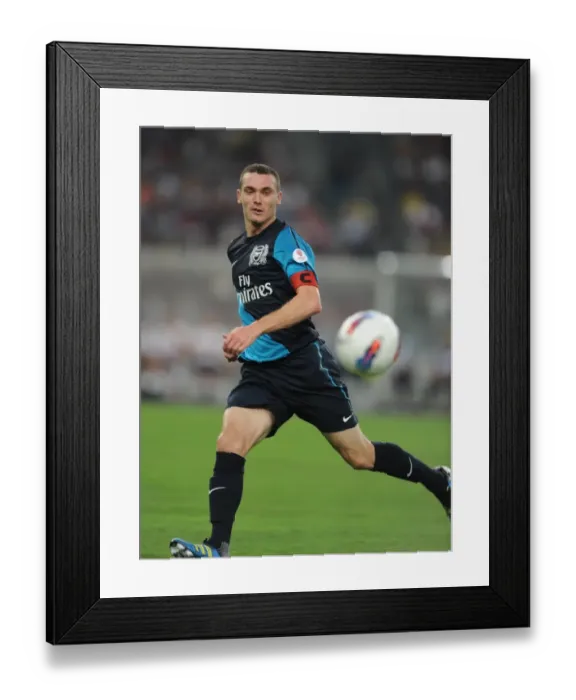 Framed Print : Thomas Vermaelen's Unstoppable Performance: Arsenal's 4-0 Triumph Over Malaysia XI Framed Print : Thomas Vermaelen's Unstoppable Performance: Arsenal's 4-0 Triumph Over Malaysia XI
