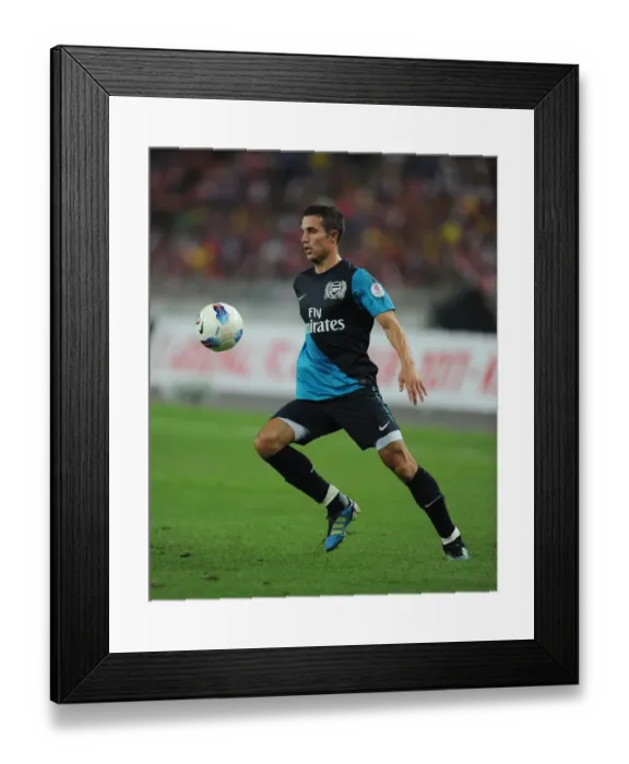 Framed Print : Robin van Persie's Brilliant Performance: Arsenal Crushes Malaysia XI 4-0 at Bukit Jalil Stadium