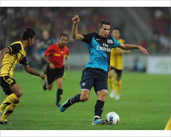Robin van Persie (Arsenal) Mohd Ismail (Malaysia). Malaysia XI 0: 4 Arsenal