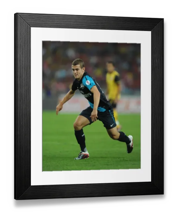 Framed Print : Jack Wilshere's Stellar Performance: Arsenal Thrashes Malaysia XI 4-0 Framed Print : Jack Wilshere's Stellar Performance: Arsenal Thrashes Malaysia XI 4-0