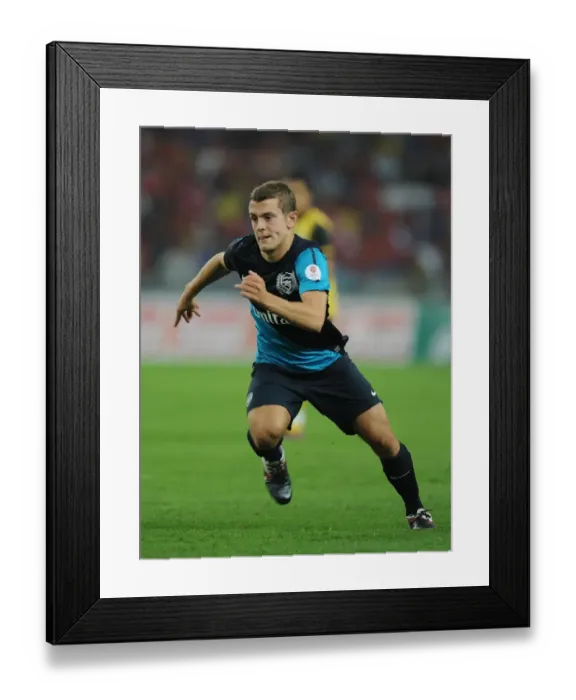 Framed Print : Jack Wilshere's Stellar Show: Arsenal Thrashes Malaysia XI 4-0