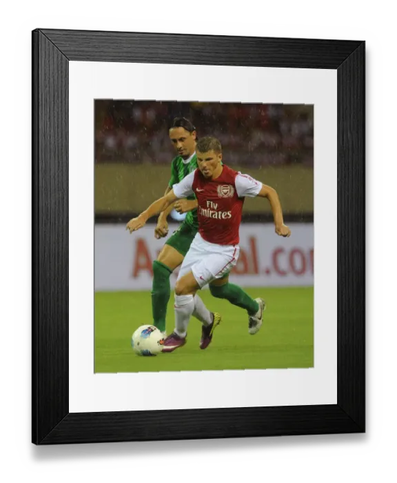 Framed Print : Andrey Arshavin vs Shen Longyuan: Hangzhou Greentown vs Arsenal, China, 2011 Framed Print : Andrey Arshavin vs Shen Longyuan: Hangzhou Greentown vs Arsenal, China, 2011