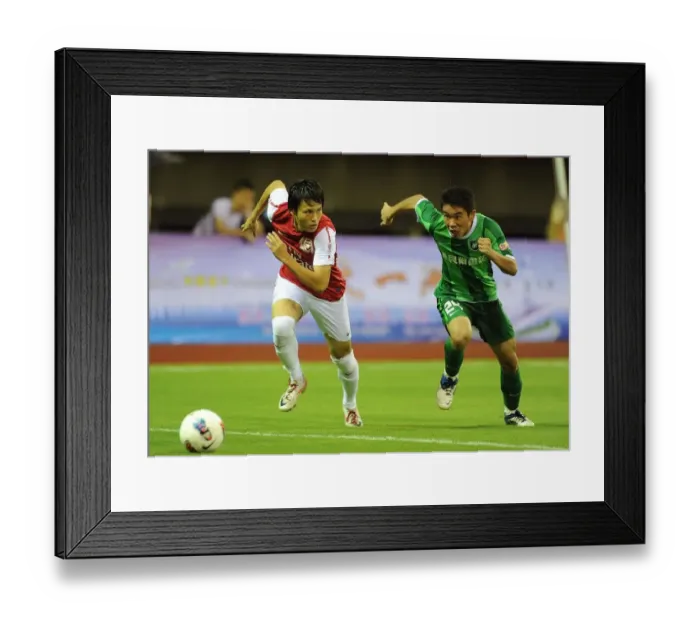 Framed Print : Ryo Miyaichi vs. Liu Bin: Clash in the Far East - Hangzhou Greentown vs. Arsenal Framed Print : Ryo Miyaichi vs. Liu Bin: Clash in the Far East - Hangzhou Greentown vs. Arsenal