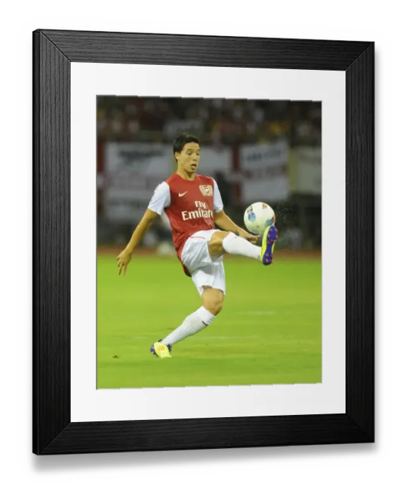 Framed Print : Samir Nasri in Action: Arsenal vs Hangzhou Greentown, China (2011)