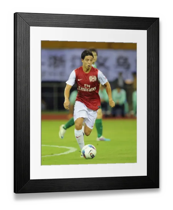 Framed Print : Samir Nasri in Action: Arsenal vs Hangzhou Greentown (2011) Framed Print : Samir Nasri in Action: Arsenal vs Hangzhou Greentown (2011)