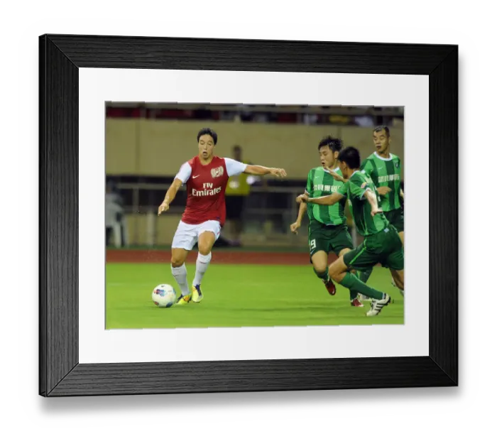 Framed Print : Samir Nasri Faces Off Against Hangzhou Greentown in Pre-Season Friendly