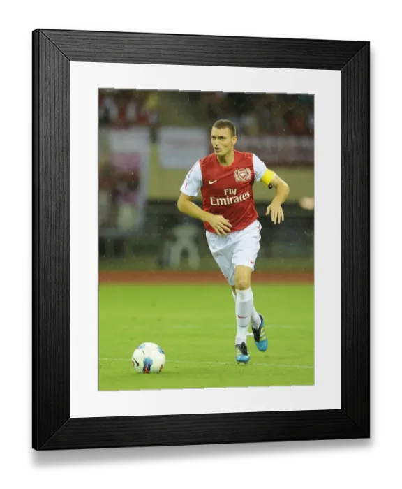 Framed Print : Thomas Vermaelen in Action: Arsenal vs Hangzhou Greentown (2011)