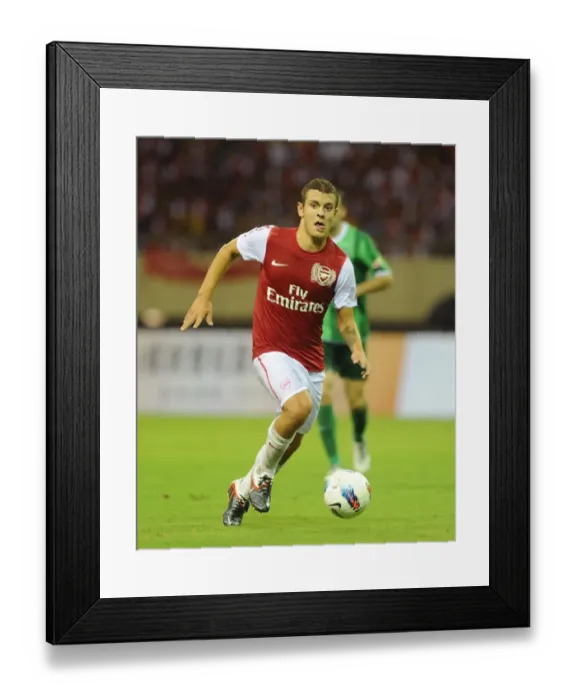 Framed Print : Jack Wilshere in Action: Arsenal vs Hangzhou Greentown, China (2011)