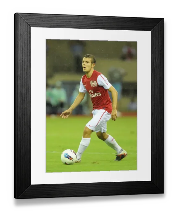 Framed Print : Jack Wilshere in Action: Hangzhou Greentown vs Arsenal, China, 2011 Framed Print : Jack Wilshere in Action: Hangzhou Greentown vs Arsenal, China, 2011