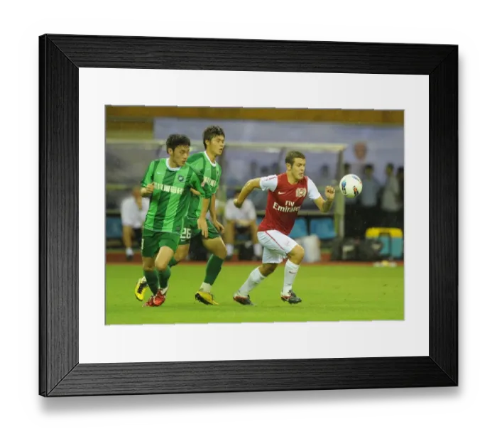 Framed Print : Jack Wilshere vs. Yang Chen and Wang Quan: Hangzhou Greentown vs. Arsenal, China, 2011 Framed Print : Jack Wilshere vs. Yang Chen and Wang Quan: Hangzhou Greentown vs. Arsenal, China, 2011