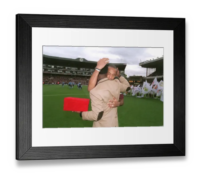 Framed Print : Thierry Henry is presented with a golden cannon by Ian Wright for becoming Arsenals all time record goalscorer. Arsenal 1: 0 Manchester City. FA Premier League. Arsenal Stadium, Highbury, London, 22 / 10 / 05. Credit: Arsenal Football Club / Framed Print : Thierry Henry is presented with a golden cannon by Ian Wright for becoming Arsenals all time record goalscorer. Arsenal 1: 0 Manchester City. FA Premier League. Arsenal Stadium, Highbury, London, 22 / 10 / 05. Credit: Arsenal Football Club /