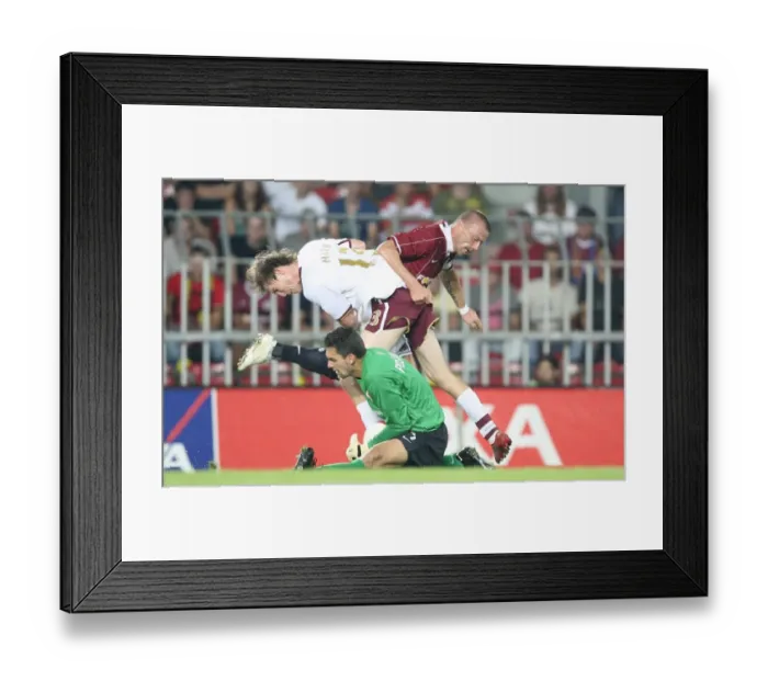 Framed Print : Arsenal's Alex Hleb Faces Off Against Sparta Prague's Tomas Repka and Tomas Postulka in Champions League Clash Framed Print : Arsenal's Alex Hleb Faces Off Against Sparta Prague's Tomas Repka and Tomas Postulka in Champions League Clash