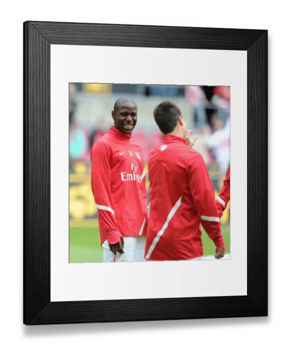 Framed Print : Arsenal: Benik Afobe and Samir Nasri Share a Laugh during Pre-Season Friendly against Cologne