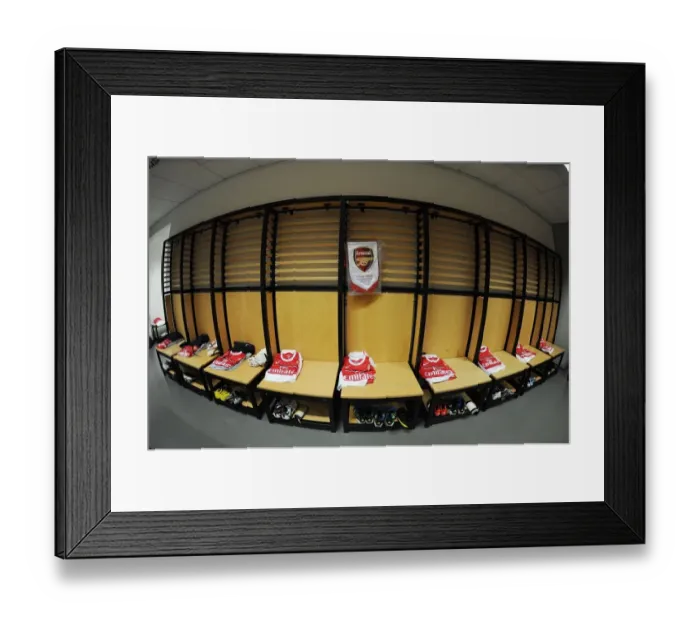 Framed Print : Behind the Scenes: Arsenal's Changing Room before Cologne Match