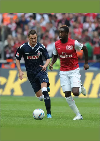 Clash of Forces: Novakovic vs. Djourou in Cologne's Battle with Arsenal