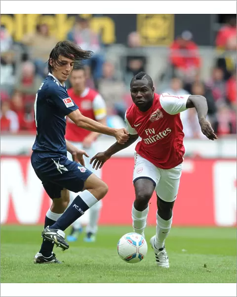 Clash of Forces: Frimpong vs. Geromel in Cologne's Pre-Season Battle with Arsenal