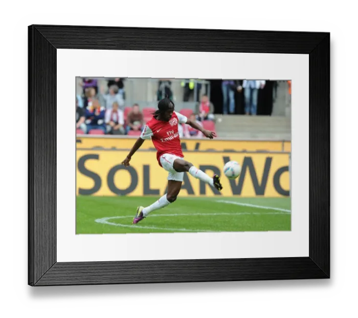 Framed Print : Gervinho Scores the Opener: Arsenal's Pre-Season Victory over Cologne
