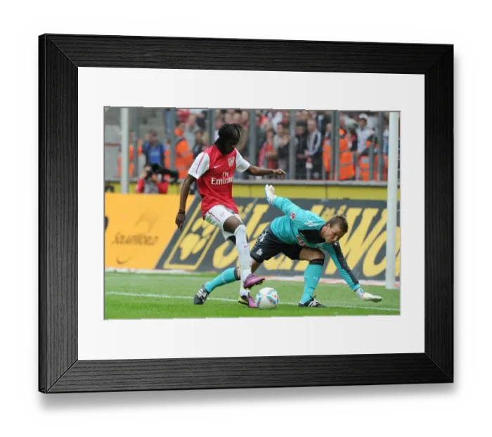 Framed Print : Gervinho's Shot Saved by Rensing in Cologne Friendly