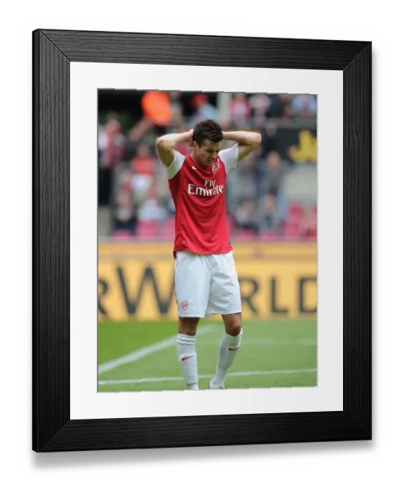 Framed Print : Dejected Carl Jenkinson After His Own Goal: Cologne vs Arsenal Pre-Season Friendly Framed Print : Dejected Carl Jenkinson After His Own Goal: Cologne vs Arsenal Pre-Season Friendly