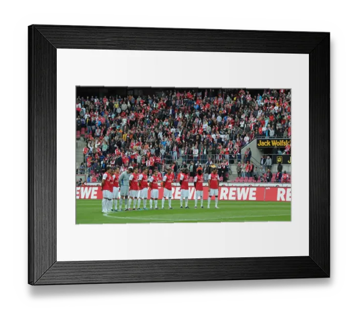 Framed Print : Arsenal Honors Victims of Norway Tragedy in Pre-Season Friendly Against Cologne