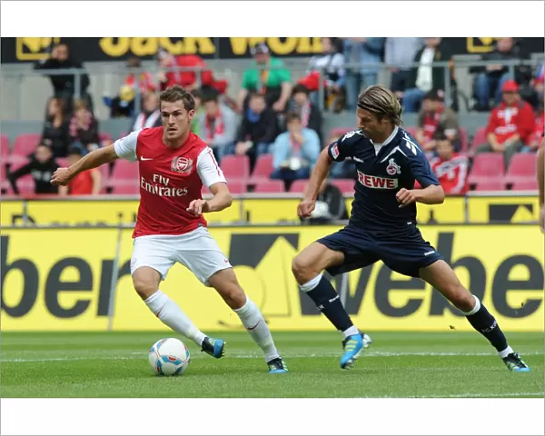 Ramsey Takes on Lanig: Cologne vs Arsenal Pre-Season Clash