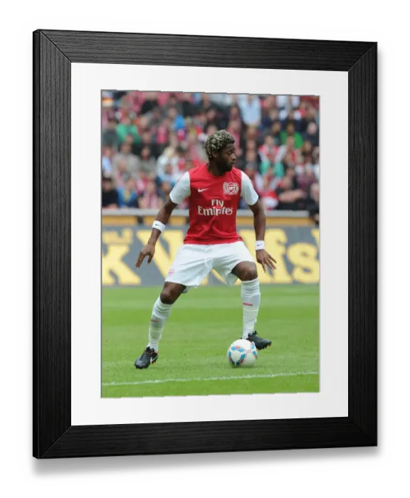 Framed Print : Alex Song in Action: Cologne vs Arsenal Pre-Season Friendly
