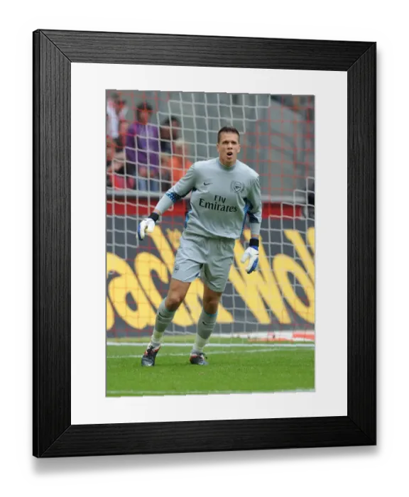 Framed Print : Wojciech Szczesny in Action for Arsenal against Cologne