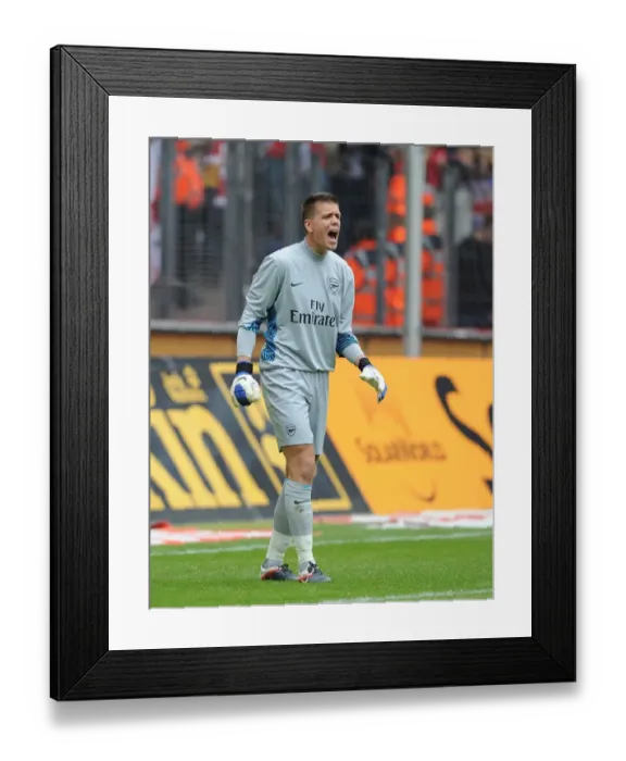 Framed Print : Wojciech Szczesny: Arsenal's Star Goalkeeper Shines in Cologne Friendly Framed Print : Wojciech Szczesny: Arsenal's Star Goalkeeper Shines in Cologne Friendly