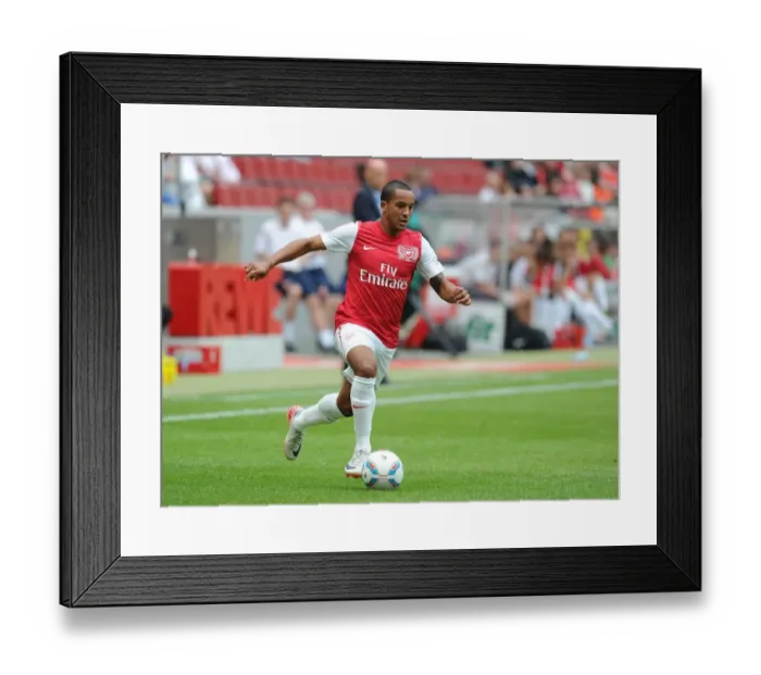 Framed Print : Theo Walcott in Action: Arsenal vs Cologne Pre-Season Friendly (2011) Framed Print : Theo Walcott in Action: Arsenal vs Cologne Pre-Season Friendly (2011)