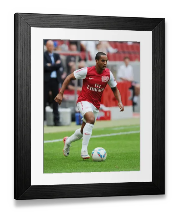 Framed Print : Theo Walcott in Action: Cologne vs Arsenal, 2011