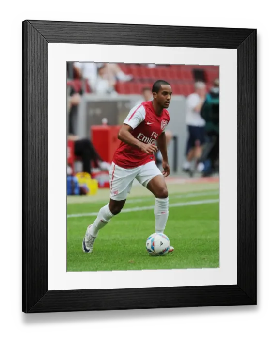 Framed Print : Theo Walcott's Brilliant Performance: Arsenal Secures Pre-Season Victory over Cologne