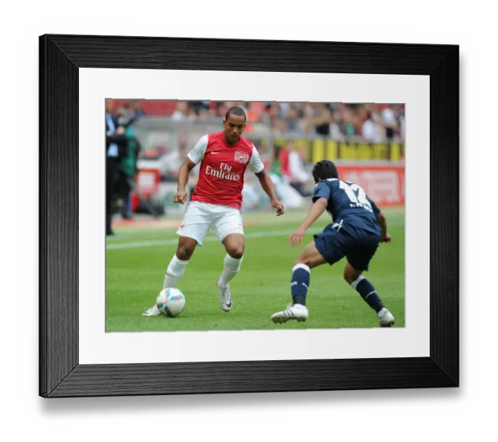 Framed Print : Theo Walcott vs Andrezinho: Clash in Pre-Season Friendly between Cologne and Arsenal Framed Print : Theo Walcott vs Andrezinho: Clash in Pre-Season Friendly between Cologne and Arsenal