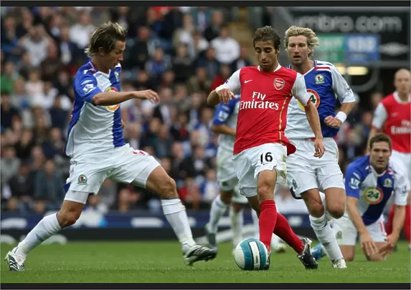 Mathieu Flamini (Arsenal) Morten Gamst Pedersen and Robbie Savage (Blackburn Rovers)