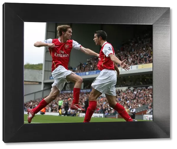 Robin van Persie celebrates scoring the Arsenal goal with Alex Hleb