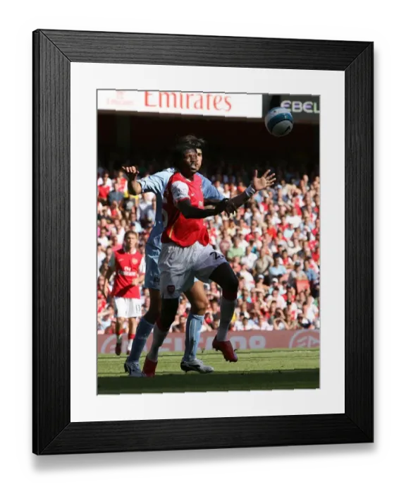 Framed Print : Emmanuel Adebayor (Arsenal) Javier Garrido (Man City) Framed Print : Emmanuel Adebayor (Arsenal) Javier Garrido (Man City)